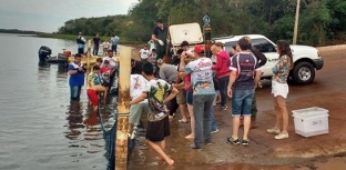 Itaipu faz soltura de peixes em torneio de pesca